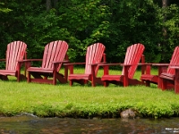 45238RoCrLe - Adirondack Chairs on the neighbour's yard   Each New Day A Miracle  [  Understanding the Bible   |   Poetry   |   Story  ]- by Pete Rhebergen